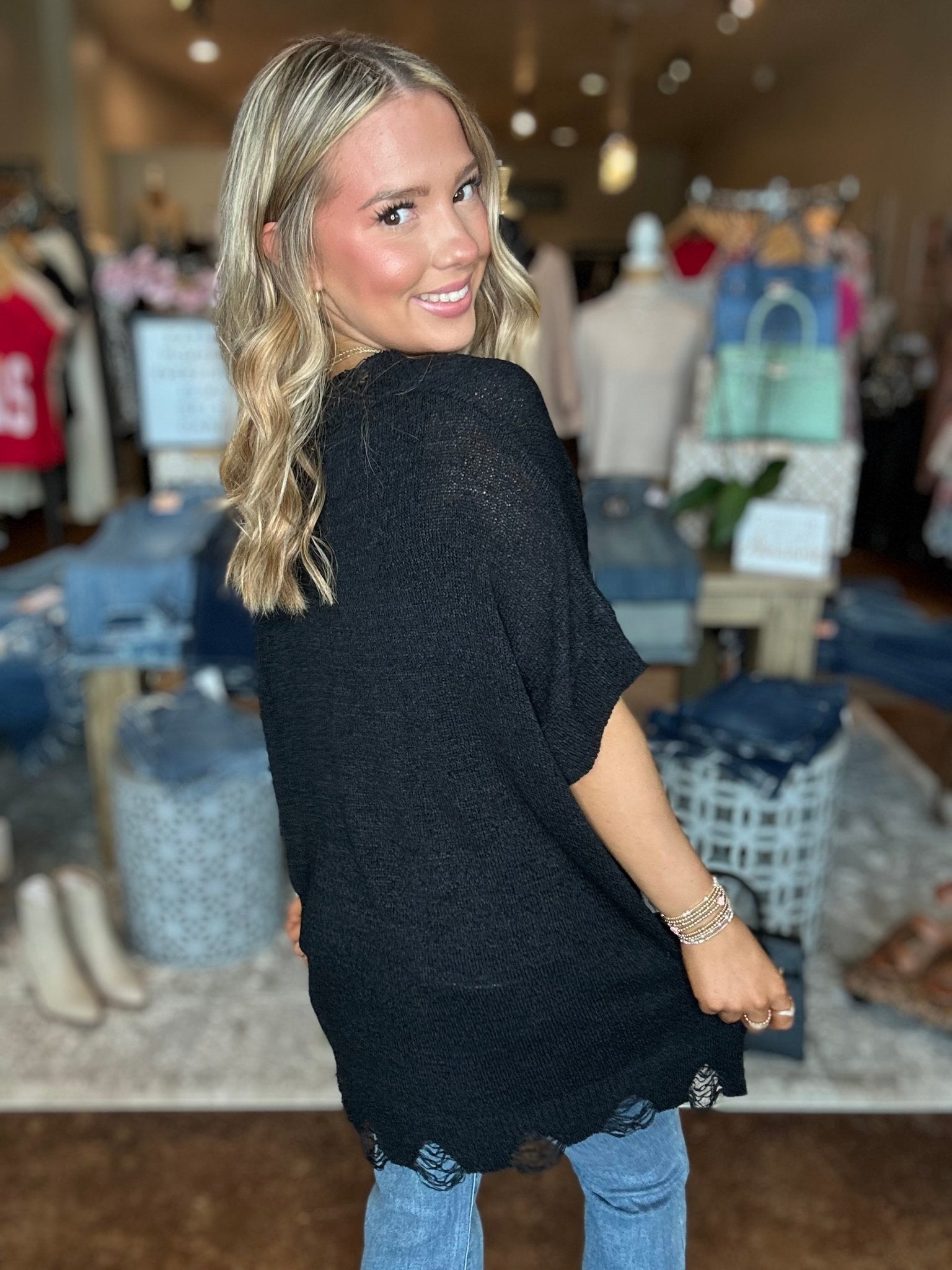 Distressed Sweater Top With Front Pocket - Mainstream Boutique