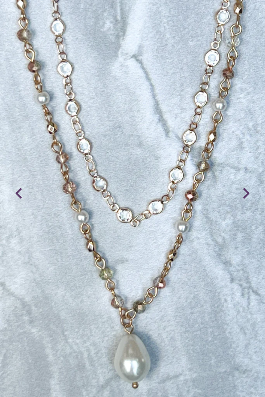 Pearl, crystals layered on two separate gold chains.