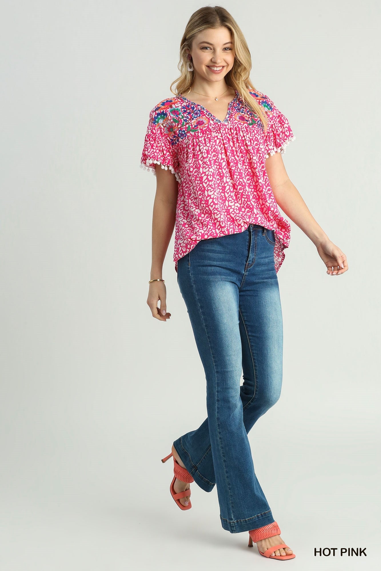 Animal Print Split Neck Ruffle Sleeve Top With Pom Pom Fringe Detail & Flower Embroidery - Mainstream Boutique
