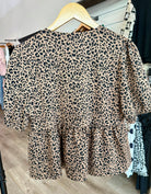 COTTON ANIMAL PRINT PUFF SHORT SLEEVE BOW TIE FRONT PEPLUM - Mainstream Boutique