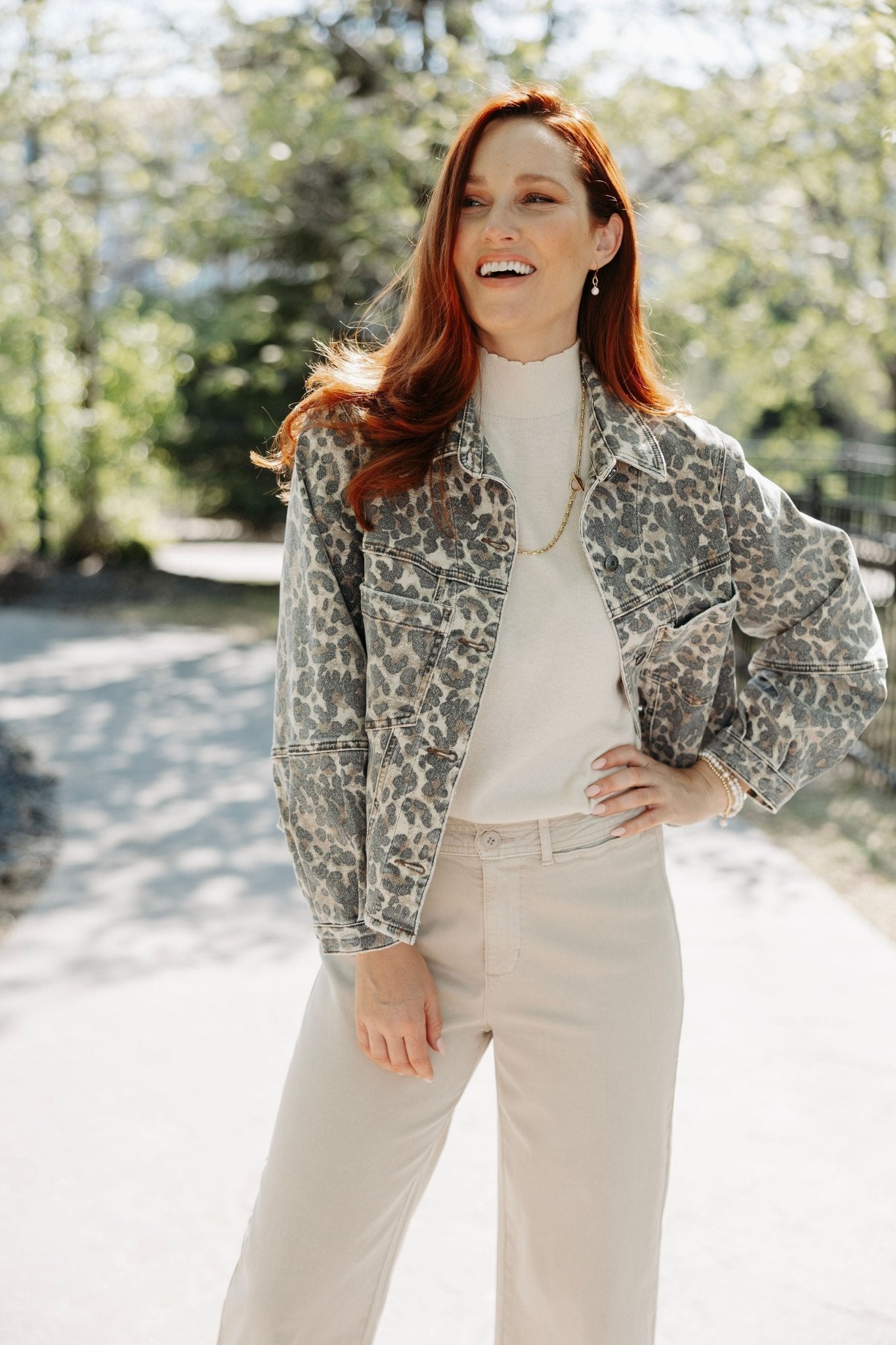 Woman wearing the animal print jacket from Mainstream Boutique Bloomington