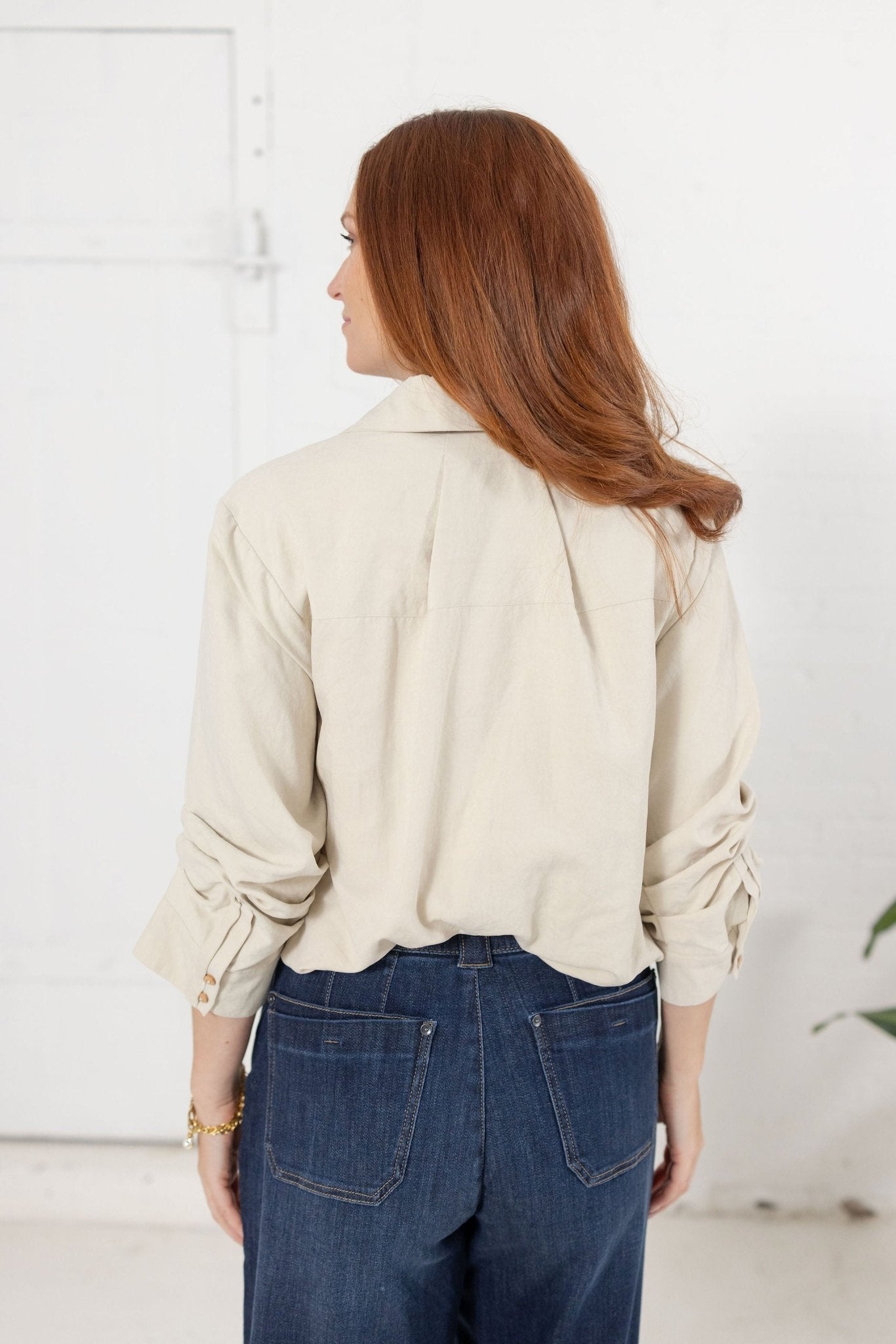 Tucked Sleeve Bubble Hem Top With Button Front - Mainstream Boutique